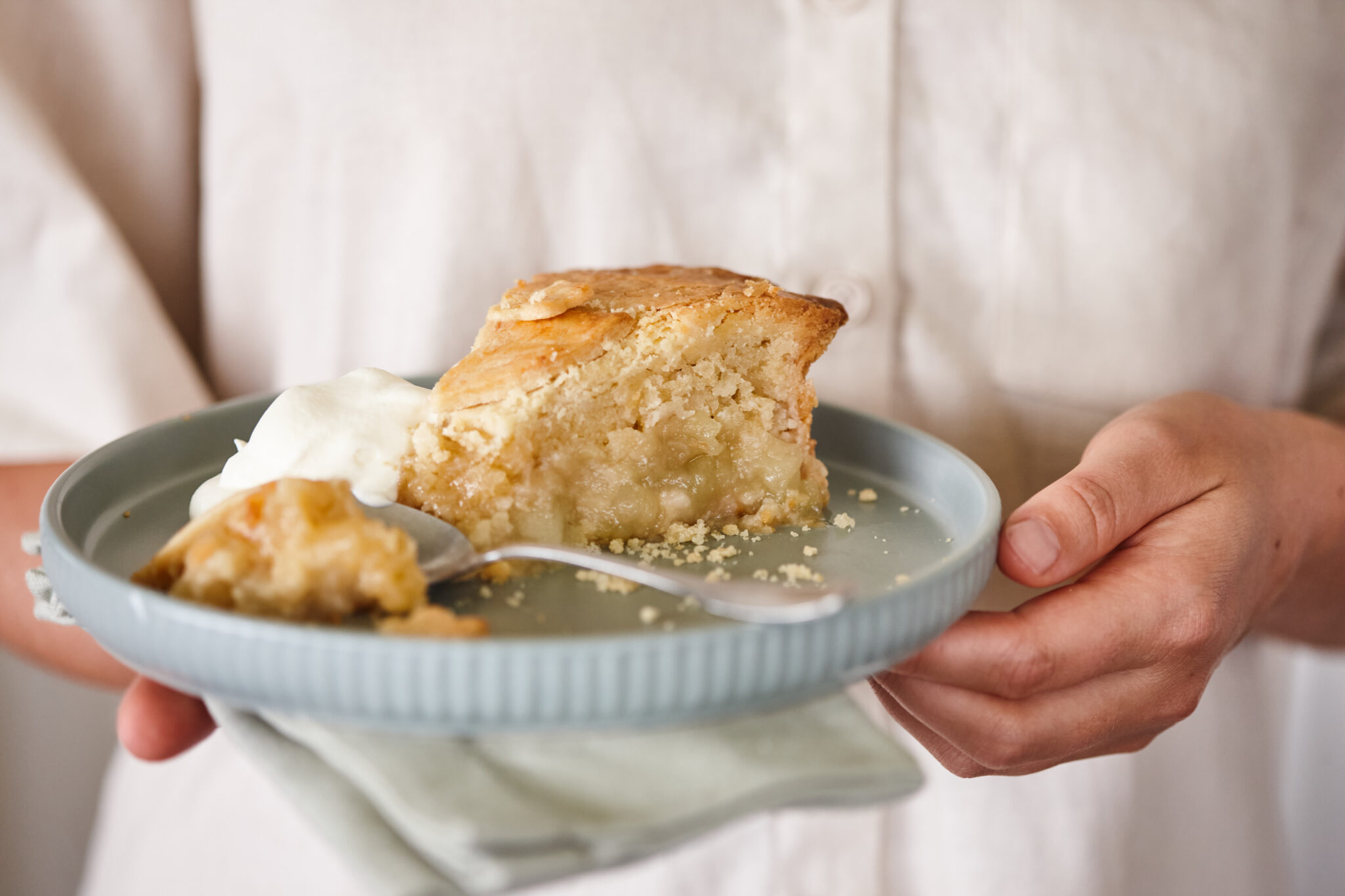 Slice of apple and macadamia frangipane pie