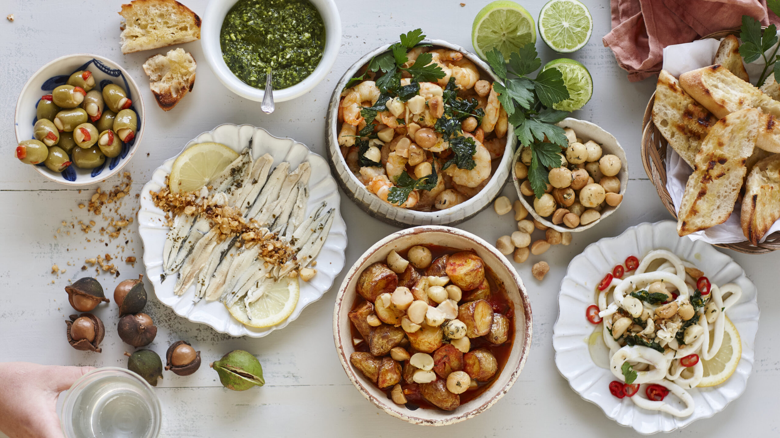 Calamari with fried parsley, macadamia and lemon zest topping