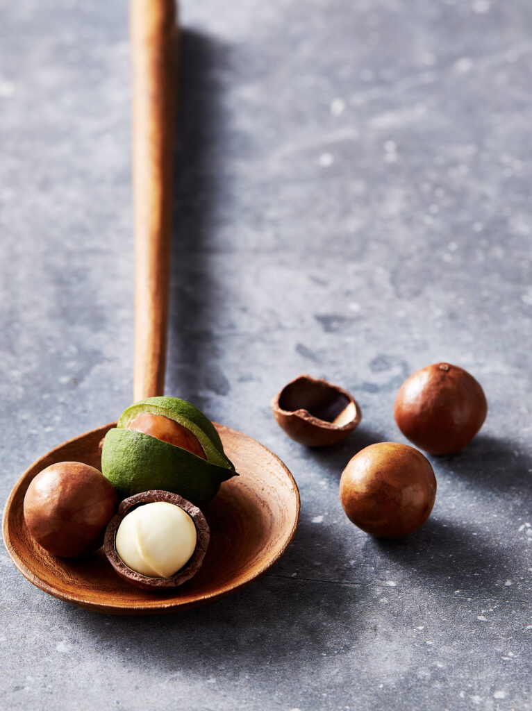 maca nuts on a wooden spoon