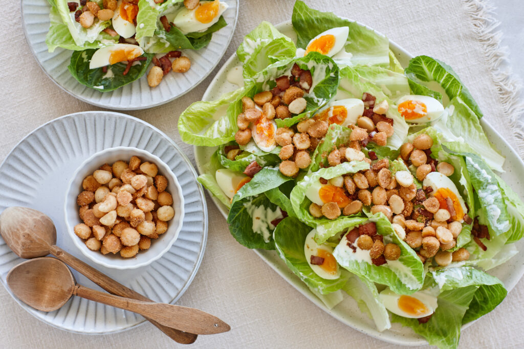 Caesar salad with garlic macadamias