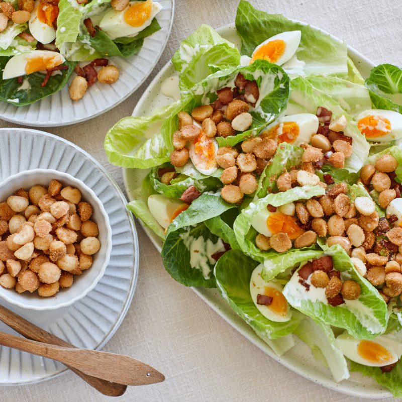 Caesar salad with garlic macadamias