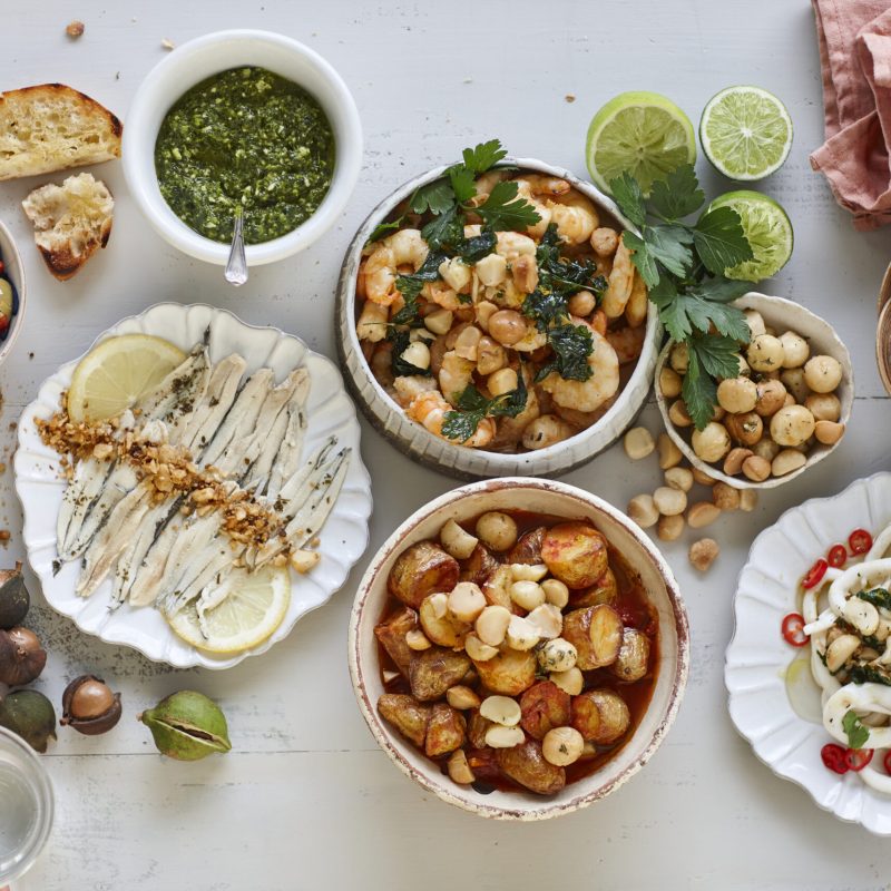 Calamari-with-fried-parsley-macadamia-and-lemon-zest-topping-scaled