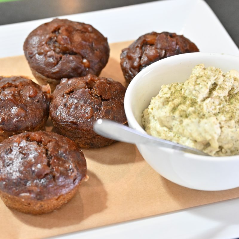 Macadamia and date breakfast pudding with macadamia and lemon myrtle crème fraiche